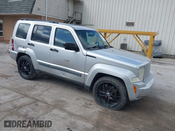 2009 Jeep Liberty Sport with VIN 1J8GN28K39W520228, listed as a IAAI auction lot 41961381 with 196,187 mi miles. Bid and sale history available at carsss.com. Image 1.