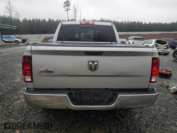 2014 Ram 1500 Lone Star z VIN 1C6RR6LG5ES102812, wystawiony jako Copart lot #41519565 z przebiegiem 210 145 mil mil oraz Szkoda całkowita • Salvage title. Historia ofert i sprzedaży dostępna na DreamBid. Obrazek 6.