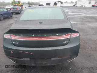 2015 Lincoln MKZ Hybrid z VIN 3LN6L2LU7FR618867, wystawiony jako IAAI lot #42291650 z przebiegiem 109 021 mil mil oraz . Historia ofert i sprzedaży dostępna na DreamBid. Obrazek 16.