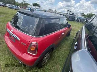 2010 MINI Hardtop with VIN WMWMF3C55ATZ24438, listed as a Copart auction lot 56395435 with Not Provided miles and Clean Title. Bid and sale history available at DreamBid. Image 4.