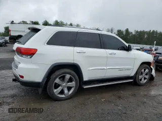 2014 Jeep Grand Cherokee Limited with VIN 1C4RJFBG9EC200141, listed as a Copart auction lot 60507385 with 101,917 mi miles and Salvage title. Bid and sale history available at DreamBid. Image 3.