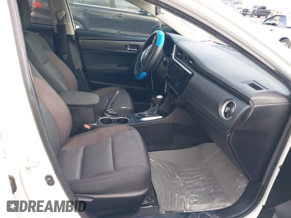 2019 Toyota Corolla L with VIN 5YFBURHE7KP908794, listed as a IAAI auction lot 38524964 with 65,069 mi miles. Bid and sale history available at carsss.com. Image 5.