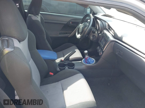 2014 Scion tC with VIN JTKJF5C78E3075164, listed as a IAAI auction lot 41922609 with 142,064 mi miles. Bid and sale history available at carsss.com. Image 5.