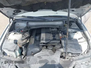 2005 BMW 3 Series 325i with VIN WBAEV33485KW18747, listed as a IAAI auction lot 42145384 with 147,120 mi miles and . Bid and sale history available at carsss.com. Image 10.