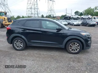 2016 Hyundai Tucson SE z VIN KM8J3CA45GU041303, wystawiony jako IAAI lot #42463591 z przebiegiem 96 516 mil mil oraz . Historia ofert i sprzedaży dostępna na DreamBid. Obrazek 14.