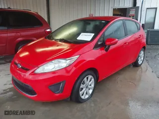 2012 Ford Fiesta SE with VIN 3FADP4EJ4CM215670, listed as a IAAI auction lot 41980900 with 87,874 mi miles. Bid and sale history available at carsss.com. Image 2.