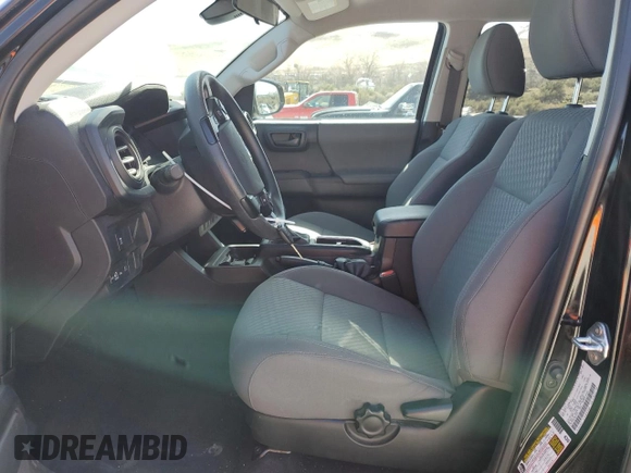 2023 Toyota Tacoma SR z VIN 3TMCZ5AN1PM643457, wystawiony jako Copart lot #51304985 z przebiegiem 9 673 mil mil oraz Szkoda całkowita • Salvage title. Historia ofert i sprzedaży dostępna na DreamBid. Obrazek 7.