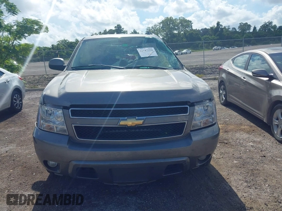 2007 Chevrolet Suburban LS with VIN 1GNFC16J77R260500, listed as a IAAI auction lot 42787990 with 167,163 mi miles and . Bid and sale history available at DreamBid. Image 13.