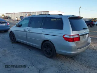 2006 Honda Odyssey Touring z VIN 5FNRL38856B098897, wystawiony jako IAAI lot #41251740 z przebiegiem 258 408 mil mil oraz . Historia ofert i sprzedaży dostępna na DreamBid. Obrazek 3.
