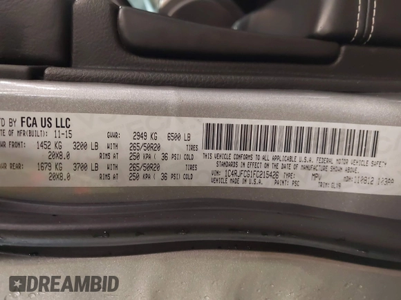 2015 Jeep Grand Cherokee Overland with VIN 1C4RJFCG1FC215426, listed as a IAAI auction lot 41689821 with 128,563 mi miles. Bid and sale history available at carsss.com. Image 9.