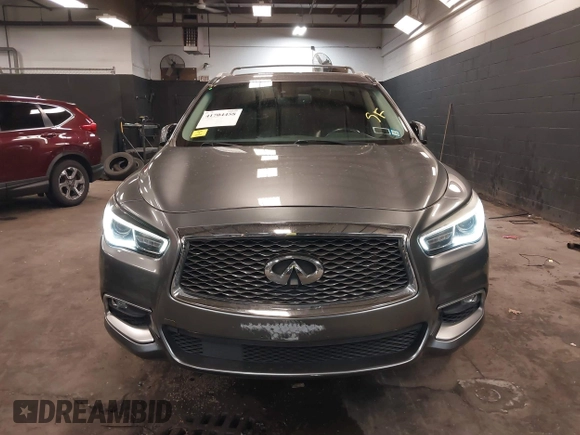 2016 Infiniti QX60 with VIN 5N1AL0MM1GC526389, listed as a IAAI auction lot 41704458 with 103,931 mi miles and . Bid and sale history available at DreamBid. Image 12.