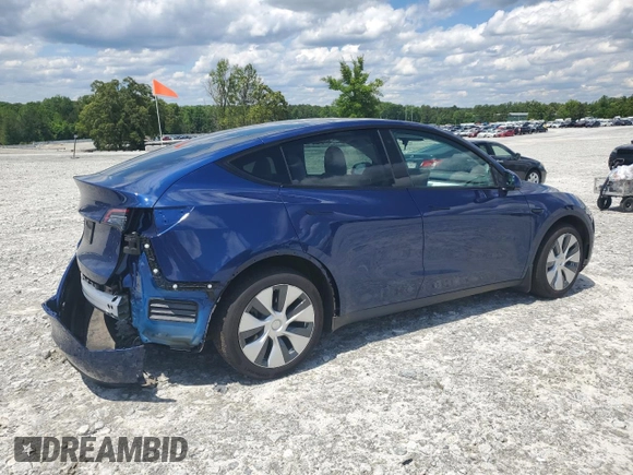 2022 Tesla Model Y Long Range z VIN 7SAYGDEE4NF426893, wystawiony jako Copart lot #55809275 z przebiegiem 16 083 mil mil oraz Szkoda całkowita • Salvage title. Historia ofert i sprzedaży dostępna na DreamBid. Obrazek 3.