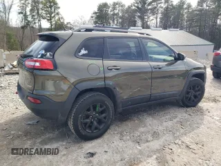 2015 Jeep Cherokee Trailhawk with VIN 1C4PJMBS5FW725729, listed as a Copart auction lot 49943495 with 139,796 mi miles and Clean Title. Bid and sale history available at carsss.com. Image 3.