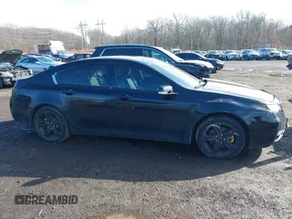 2013 Acura TL Technology z VIN 19UUA9F59DA000912, wystawiony jako IAAI lot #41533865 z przebiegiem 164 690 mil mil oraz . Historia ofert i sprzedaży dostępna na DreamBid. Obrazek 13.