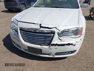 2013 Chrysler 300 with VIN 2C3CCAAG0DH508643, listed as a IAAI auction lot 41765128 with 203,871 mi miles. Bid and sale history available at carsss.com. Image 6.