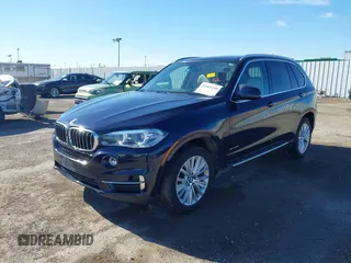 2016 BMW X5 sDrive35i with VIN 5UXKR2C55G0R71330, listed as a IAAI auction lot 41661140 with 128,457 mi miles. Bid and sale history available at carsss.com. Image 17.