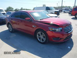 2014 Ford Taurus SEL with VIN 1FAHP2E86EG186642, listed as a IAAI auction lot 41901768 with 106,057 mi miles. Bid and sale history available at carsss.com. Image 1.