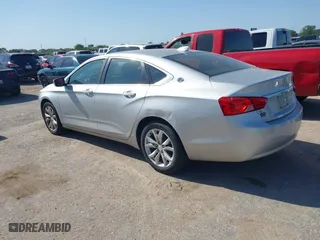2016 Chevrolet Impala LT with VIN 2G1115S33G9103539, listed as a IAAI auction lot 41998565 with 128,595 mi miles. Bid and sale history available at carsss.com. Image 3.