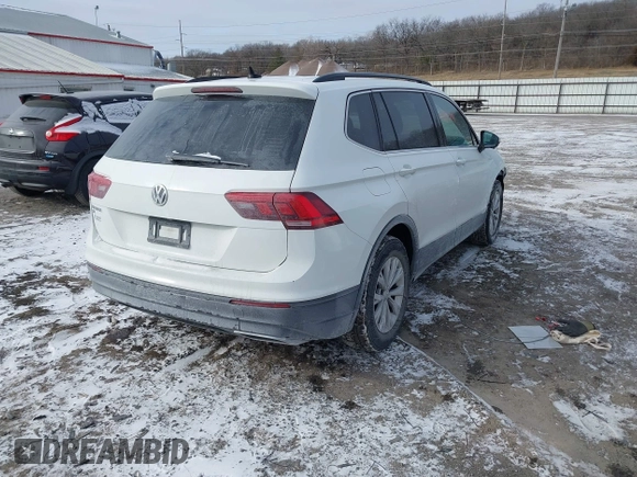2019 Volkswagen Tiguan SE with VIN 3VV3B7AX7KM040136, listed as a IAAI auction lot 41397714 with 82,302 mi miles and . Bid and sale history available at DreamBid. Image 4.
