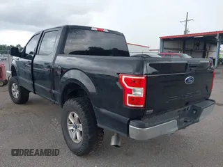 2020 Ford F-150 XL with VIN 1FTEW1C51LKD27579, listed as a IAAI auction lot 42527114 with 128,151 mi miles and . Bid and sale history available at DreamBid. Image 3.