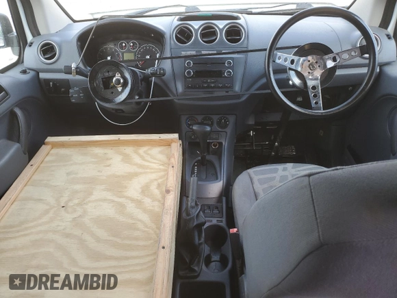 2013 Ford Transit Connect XLT with VIN NM0KS9BN4DT125925, listed as a Copart auction lot 55087585 with 118,671 mi miles and Salvage title. Bid and sale history available at DreamBid. Image 8.