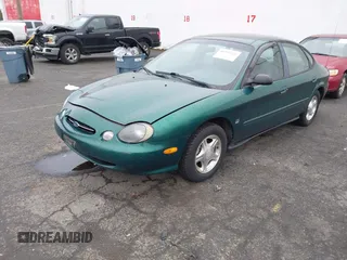 1999 Ford Taurus z VIN 1FAFP52S9XG309250, wystawiony jako IAAI lot #41797222 z przebiegiem 102 676 mil mil oraz . Historia ofert i sprzedaży dostępna na DreamBid. Obrazek 17.