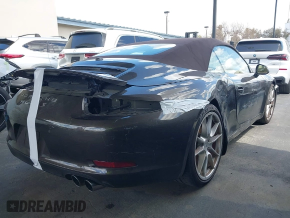 2012 Porsche 911 Carrera S with VIN WP0CB2A98CS154934, listed as a IAAI auction lot 41871101 with 69,411 mi miles and . Bid and sale history available at DreamBid. Image 22.