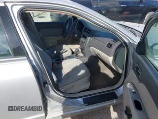 2012 Ford Fusion S with VIN 3FAHP0GA2CR143572, listed as a IAAI auction lot 41826526 with 199,083 mi miles. Bid and sale history available at carsss.com. Image 5.