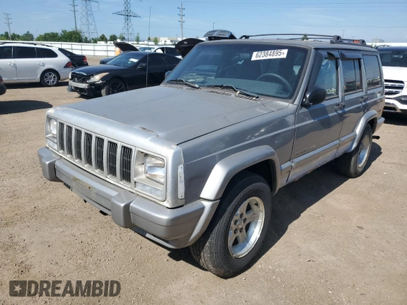 2001 Jeep Cherokee Sport z VIN 1J4FF58S61L540796, wystawiony jako Copart lot #62384895 z przebiegiem 209 294 mil mil oraz Czysty tytuł • Clean title. Historia ofert i sprzedaży dostępna na DreamBid. Obrazek 1.
