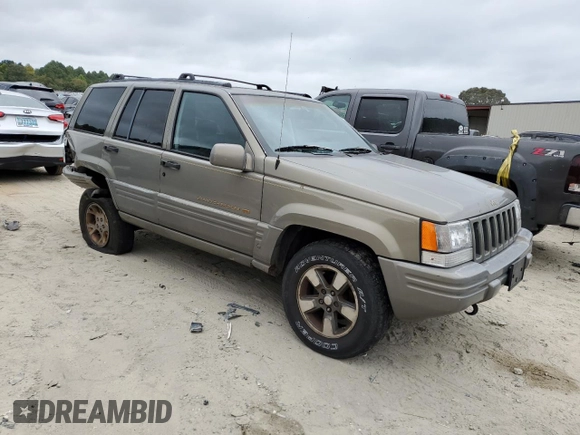 1997 Jeep Grand Cherokee Limited with VIN 1J4GZ78Y0VC599554, listed as a Copart auction lot 72006854 with 321,283 mi miles and Salvage Title. Bid and sale history available at carsss.com. Image 4.
