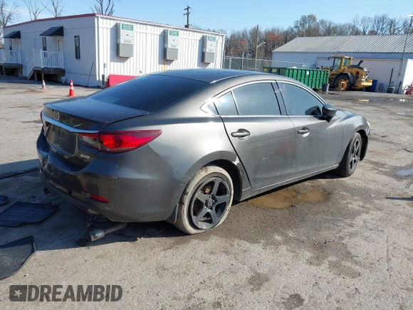 2016 Mazda 6 i Sport with VIN JM1GJ1U59G1402840, listed as a IAAI auction lot 41920724 with 147,527 mi miles and . Bid and sale history available at DreamBid. Image 4.