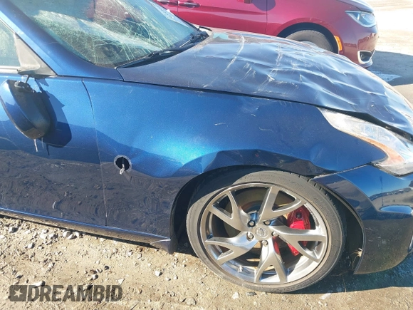 2014 Nissan 370Z Nismo with VIN JN1AZ4EH9EM635608, listed as a IAAI auction lot 41333034 with 45,354 mi miles and . Bid and sale history available at DreamBid. Image 12.