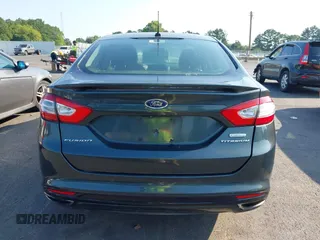 2016 Ford Fusion Titanium with VIN 3FA6P0K90GR188049, listed as a IAAI auction lot 42575477 with 239,414 mi miles and . Bid and sale history available at DreamBid. Image 16.