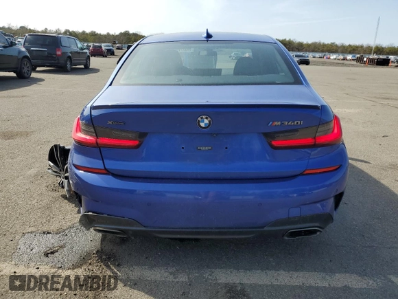 2020 BMW 3 Series M340i xDrive with VIN WBA5U9C00LFH68766, listed as a Copart auction lot 49077125 with 56,730 mi miles and Salvage Title. Bid and sale history available at DreamBid. Image 6.