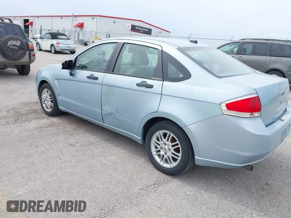 2009 Ford Focus SE with VIN 1FAHP35N59W157060, listed as a IAAI auction lot 41871757 with 141,558 mi miles. Bid and sale history available at carsss.com. Image 3.