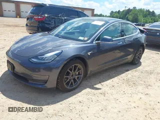 2020 Tesla Model 3 Long Range z VIN 5YJ3E1EB9LF667993, wystawiony jako IAAI lot #41990917 z przebiegiem 58 269 mil mil oraz . Historia ofert i sprzedaży dostępna na DreamBid. Obrazek 2.