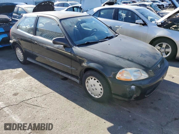1997 Honda Civic DX with VIN 2HGEJ6344VH119405, listed as a Copart auction lot 71070544 with 26,621 mi miles and Salvage Title. Bid and sale history available at DreamBid. Image 4.