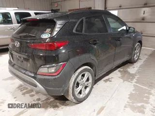 2023 Hyundai Kona SEL with VIN KM8K62AB3PU944716, listed as a IAAI auction lot 42125824 with 40,795 mi miles and . Bid and sale history available at DreamBid. Image 4.