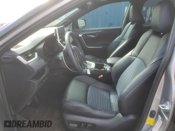 2021 Toyota RAV4 Hybrid XSE with VIN 4T3E6RFV1MU057403, listed as a Copart auction lot 47809415 with 56,570 mi miles and Salvage Title. Bid and sale history available at carsss.com. Image 7.