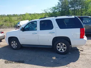 2009 GMC Yukon SLT w/4SA with VIN 1GKFK33049R241378, listed as a IAAI auction lot 42124385 with 292,192 mi miles. Bid and sale history available at carsss.com. Image 14.