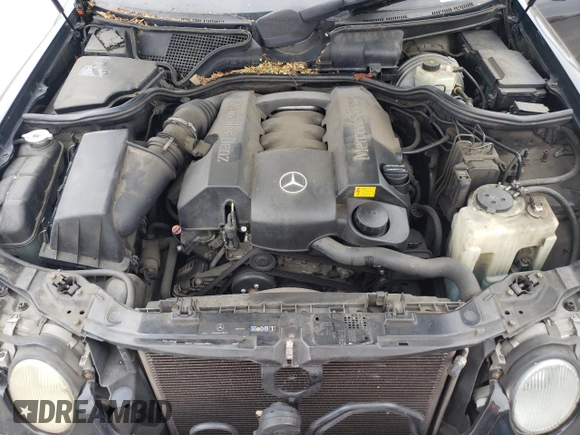 2002 Mercedes-Benz E-Class with VIN WDBJF65J42B486633, listed as a Copart auction lot 76979054 with 151,429 mi miles and Salvage Title. Bid and sale history available at carsss.com. Image 12.