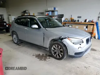 2014 BMW X1 xDrive28i z VIN WBAVL1C5XEVR95162, wystawiony jako Copart lot #55218125 z przebiegiem 108 658 mil mil oraz Szkody całkowita. Historia ofert i sprzedaży dostępna na DreamBid. Obrazek 4.