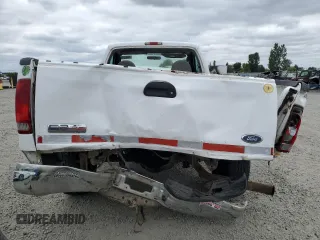 2005 Ford F-250 XL with VIN 1FTNF20595EB89821, listed as a Copart auction lot 60841825 with 133,523 mi miles and Salvage title. Bid and sale history available at DreamBid. Image 6.