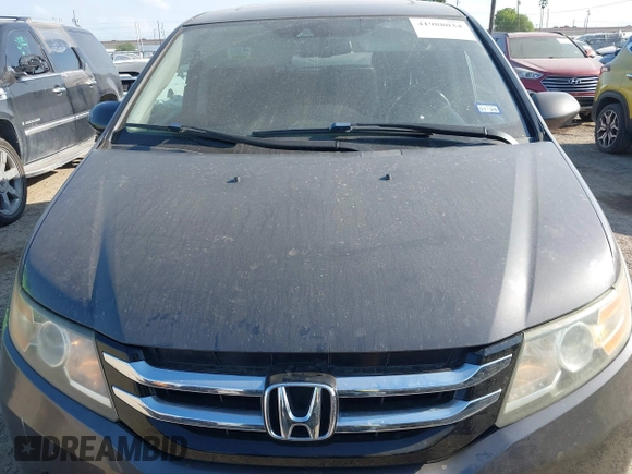 2015 Honda Odyssey EX-L with VIN 5FNRL5H67FB130663, listed as a IAAI auction lot 41988034 with 180,254 mi miles and . Bid and sale history available at carsss.com. Image 6.