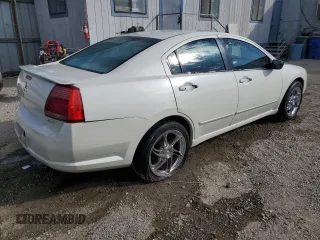 2004 Mitsubishi Galant ES z VIN 4A3AB36FX4E101970, wystawiony jako Copart lot #80471514 z przebiegiem 244 237 mil mil oraz Szkoda całkowita • Salvage title. Historia ofert i sprzedaży dostępna na DreamBid. Obrazek 3.