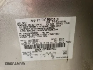 2017 Ford Flex Limited z VIN 2FMGK5D89HBA09033, wystawiony jako Copart lot #48597495 z przebiegiem 142 567 mil mil oraz Szkoda całkowita • Salvage title. Historia ofert i sprzedaży dostępna na DreamBid. Obrazek 13.