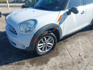 2013 MINI Countryman with VIN WMWZB3C55DWR36061, listed as a IAAI auction lot 41666672 with 155,222 mi miles and . Bid and sale history available at DreamBid. Image 6.