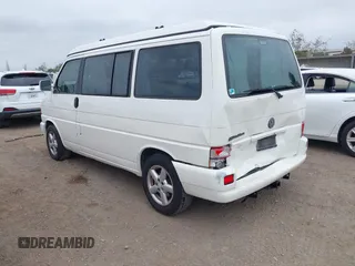 2001 Volkswagen EuroVan MV with VIN WV2NB470X1H144656, listed as a IAAI auction lot 42014536 with 230,707 mi miles and . Bid and sale history available at DreamBid. Image 3.
