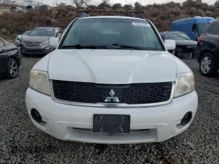 2011 Mitsubishi Endeavor LS z VIN 4A4JN2AS0BE012987, wystawiony jako Copart lot #43513375 z przebiegiem 181 386 mil mil oraz Szkoda całkowita • Salvage title. Historia ofert i sprzedaży dostępna na DreamBid. Obrazek 5.