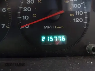 2000 Jeep Grand Cherokee Laredo with VIN 1J4GW48S8YC380039, listed as a IAAI auction lot 42510307 with 215,776 mi miles and . Bid and sale history available at DreamBid. Image 7.